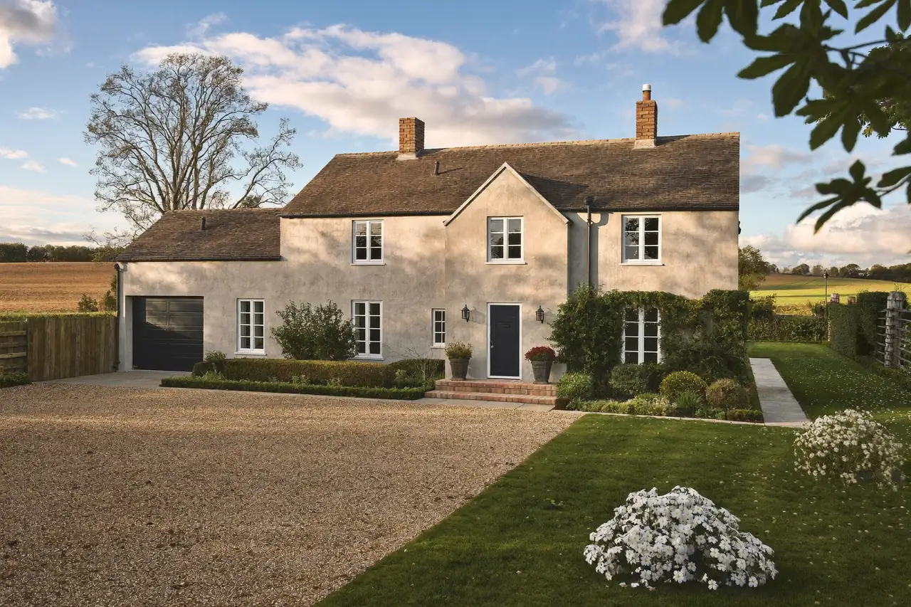 A countryside bungalow with white double-glazed windows